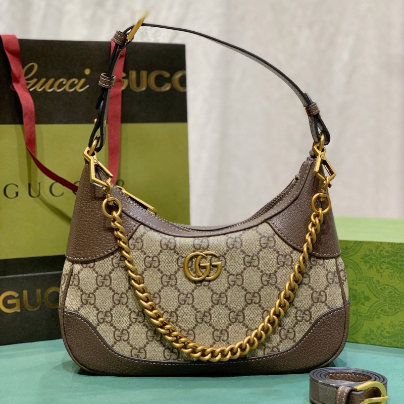 G*u*i top handle bags